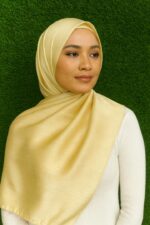 Woman wearing a soft Silk Satin hijab, styled elegant